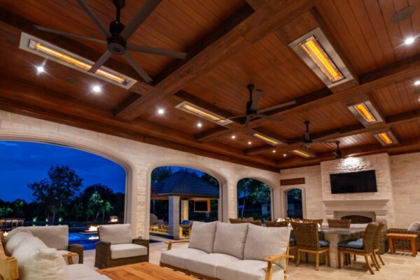 Flush ceiling heaters installed on indoor/outdoor poolside patio ceiling