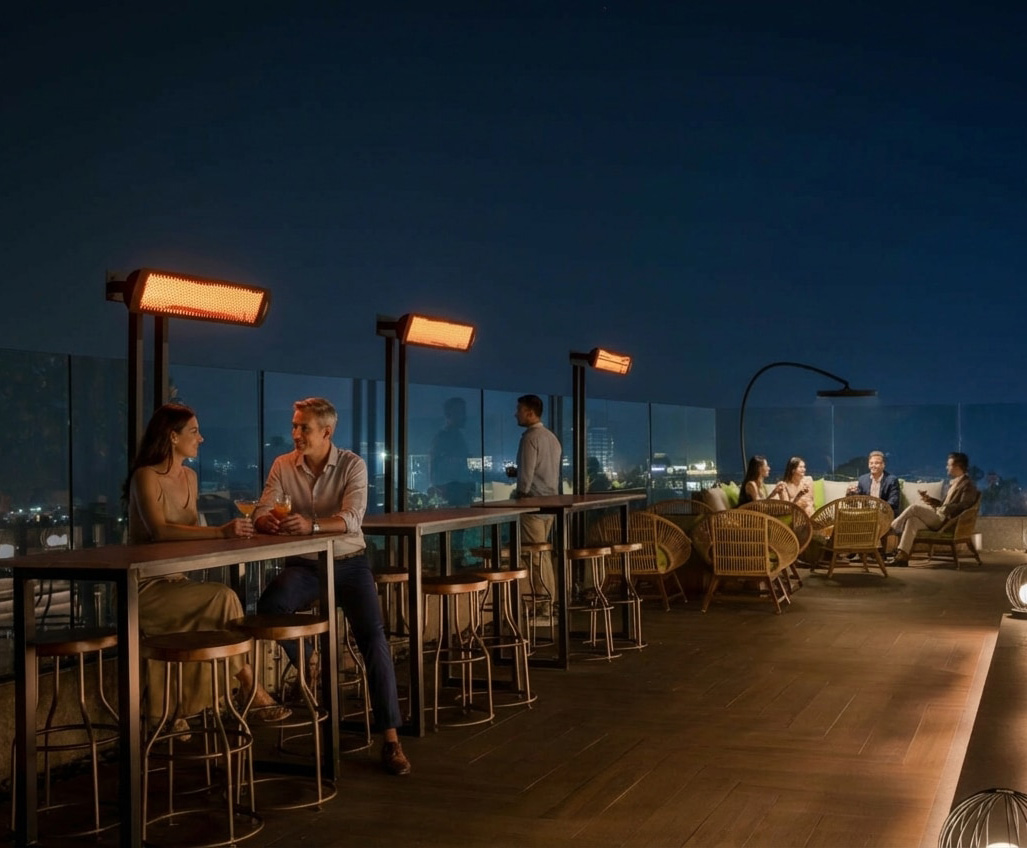 Pole mounted fixtures on rooftop patio near seating areas