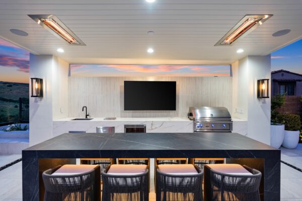 Luxury outdoor kitchen with flush ceiling heating fixtures